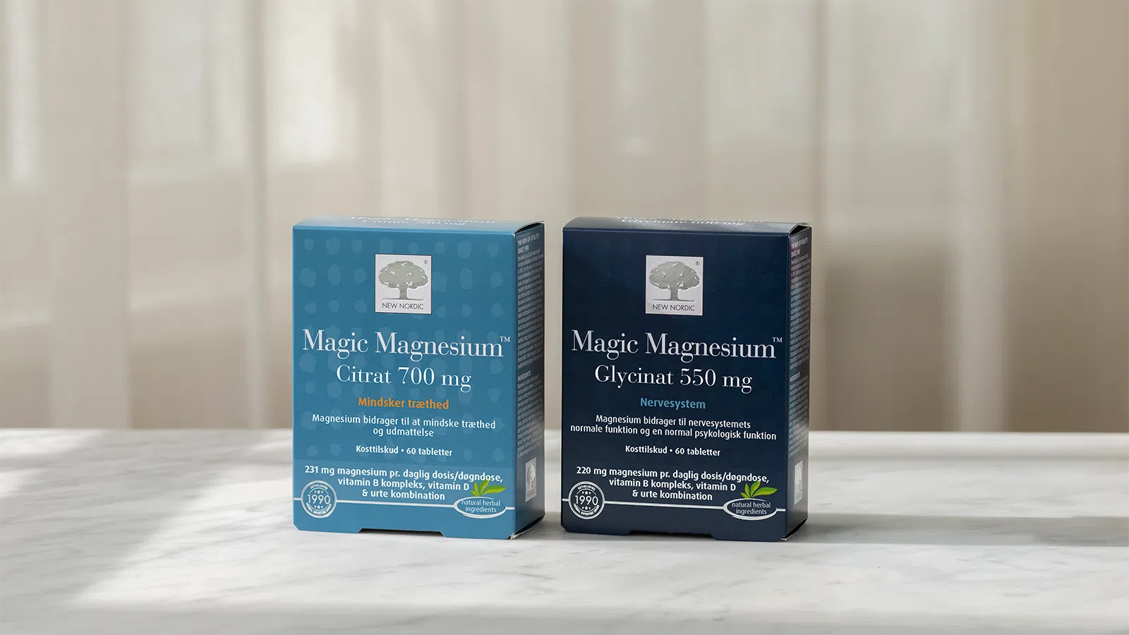 Scandinavian Values 7 Zilas „Magic Magnesium™“ citrāta 750 mg un „Magic Magnesium™“ glicināta 600 mg iepakojumi, kas izvietoti kopā.