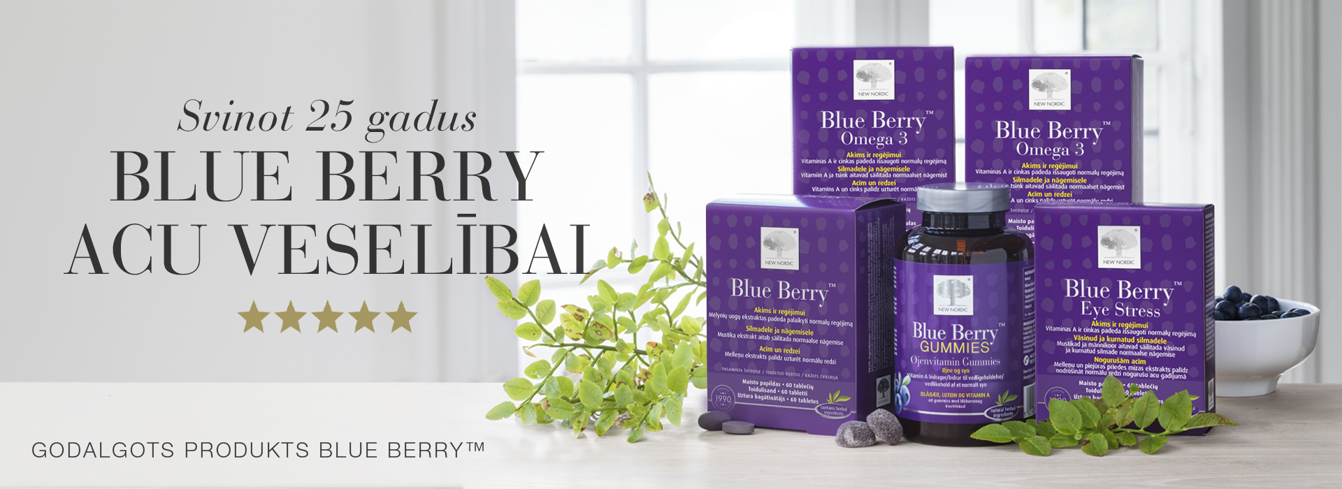 Blue Berry produktu iepakojumi violetā krāsā uz gaiša fona