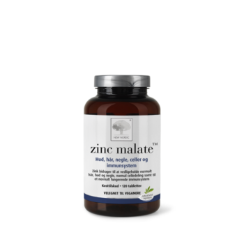 Zinc Malate uztura bagātinātāja pudelīte ar cinku uz balta fona