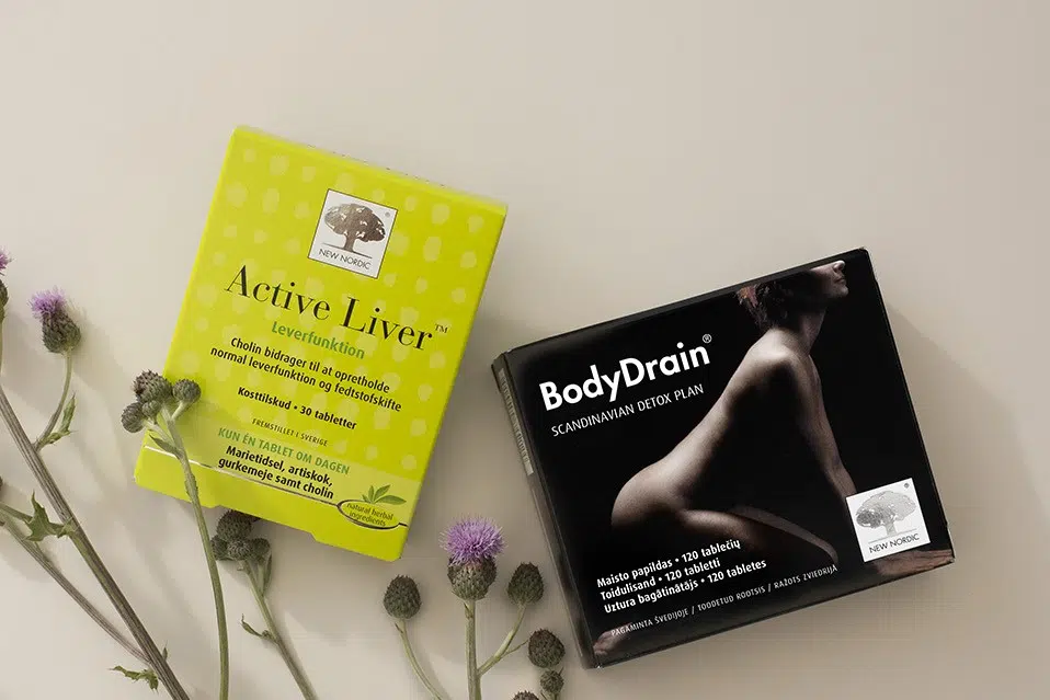 Active Liver un BodyDrain produktu iepakojumi uz neitrāla bēša fona