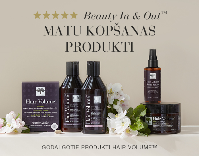 Hair Volume matu kopšanas produktu klāsts ar uzrakstu par skaistiem matiem